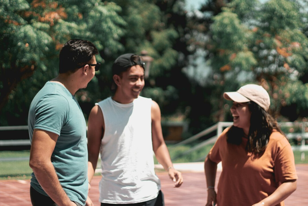 diverse youth group talking